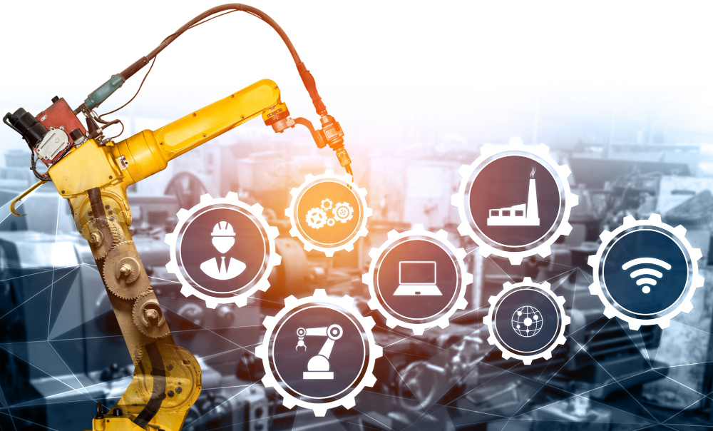 Bras robotisé dans une usine connectée illustrant la continuité d'activité et la gestion ERP industrielle