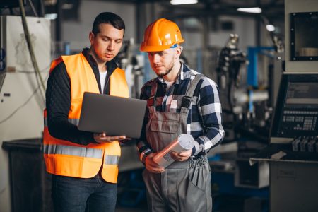 Two colleagues at a factory Two colleagues at a factory